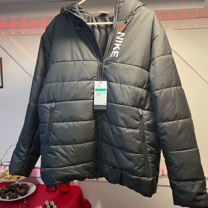 Nike men’s extra large jacket brand new with tags retails for $177